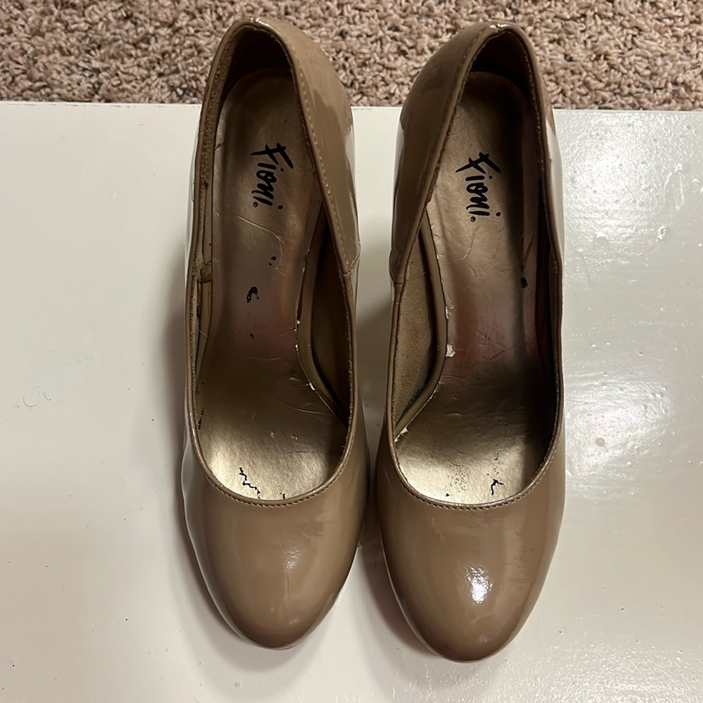 Worn heels have some scuffs here and there
